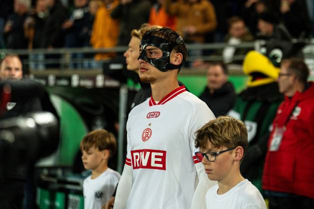 October 9, 2026, 3rd Division, Matchday 8, SC Preußen Münster vs. Rot Weiss Essen at the LVM Preußenstadion; Marvin Obuz (Essen) wearing a mask as he enters the field. IMPORTANT NOTICE: In accordance with DFB and DFL guidelines, it is prohibited to use or allow the use of photographs taken in the stadium and or during the game in the form of sequential images and or video-like photo series Copyright: xJordyxFourgonx