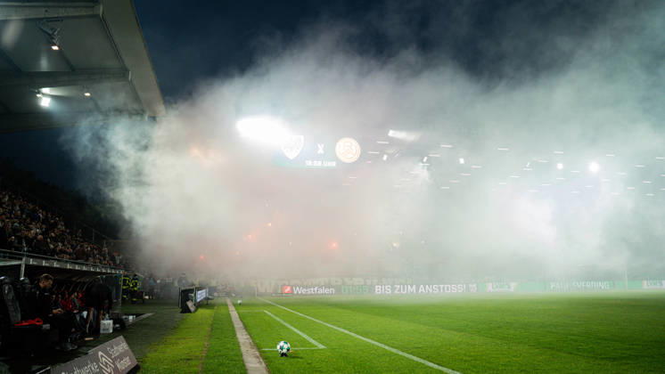 October 9, 2026, 3rd Division, Matchday 8, SC Preußen Münster vs. Rot-Weiss Essen at the LVM Preußenstadion; Rot-Weiss Essen pyrotechnics in Münster IMPORTANT NOTICE: In accordance with DFB and DFL regulations, it is prohibited to use or allow the use of photographs taken in the stadium and or during the game in the form of sequential images and or video-like photo series. Copyright: xJordyxFourgonx