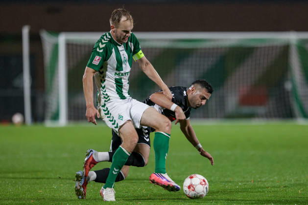 From left: Cimo Röcker (SV Werder Bremen II), 5, and Christofer David (SV Atlas Delmenhorst), 10, in a one-on-one battle; duel; dynamic play; action; game scene; October 9, 2026, Bremen, Germany, soccer, Regionalliga Nord, SV Werder Bremen II vs. SV Atlas Delmenhorst xobx