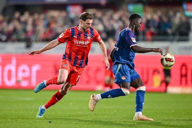 Budu Siwsiwadse of 1 FC Heidenheim 1846 and Maxwell Gyamfi of 1 FC Kaiserslautern go head-to-head during the 2. Bundesliga match between 1 FC Heidenheim and 1 FC Kaiserslautern, at the Voith Arena on October 9, 2026, in Heidenheim an der Brenz, Germany. Photo by Harry Langer, DeFodi Images. Budu Siwsiwadse of 1 FC Heidenheim 1846 and Maxwell Gyamfi of 1 FC Kaiserslautern battle for the ball during the 2nd Bundesliga match between 1 FC Heidenheim and 1 FC Kaiserslautern at Voith Arena on October 9, 2026, in Heidenheim an der Brenz, Germany Photo by Harry Langer DeFodi Images DFB and DFL regulations prohibit any use of photographs as image sequences and or quasi-video Photo by Harry Langer DeFodi Images DFB and DFL regulations prohibit any use of photographs as imSEQUENCES AND OR QUASI-VIDEO