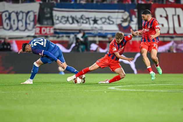Mergim Berisha 1 FC Kaiserslautern, Jan Schoeppner of 1 FC Heidenheim 1846 and Oualid Mhamdi of 1 FC Heidenheim 1846 in a tackle during the 2. Bundesliga match between 1 FC Heidenheim and 1 FC Kaiserslautern, at the Voith Arena on October 9, 2026, in Heidenheim an der Brenz, Germany. Photo by Harry Langer, DeFodi Images. Mergim Berisha of 1 FC Kaiserslautern, Jan Schoeppner of 1 FC Heidenheim 1846 and Oualid Mhamdi of 1 FC Heidenheim 1846 battle for the ball during the 2nd Bundesliga match between 1 FC Heidenheim and 1 FC Kaiserslautern at Voith Arena on October 9, 2026 in Heidenheim an der Brenz, Germany Photo by Harry Langer DeFodi Images DFB and DFL regulations prohibit any use of photographs as image sequences and or quasi-video Photo by Harry Langer DeFodi Images DFB and DFL regulations prohibit any use of photographs as imSEQUENCES AND OR QUASI-VIDEO