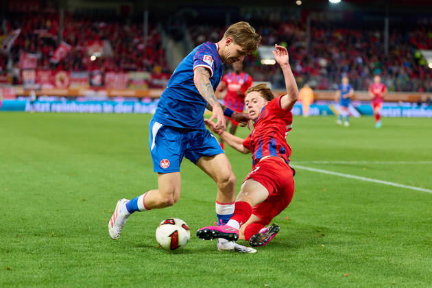 Tackle, duel between Paul Joly (1 FC Kaiserslautern, 26) and Michael Heule (1 FC Heidenheim, 27, GER), 1 FC Heidenheim 1846 vs. 1 FC Kaiserslautern, soccer, 2. Bundesliga, Matchday 7, 2026–2027 season, October 9, 2026 DFL regulations prohibit any use of photographs as image sequences and or quasi-video GER, 1 FC Heidenheim 1846 vs. 1 FC Kaiserslautern, soccer, 2. Bundesliga, Matchday 7, 2026–2027 season, October 9, 2026, Heidenheim an der Brenz Copyright: xEibner-Pressefoto GeraldxOelze-dexStoppanyx EP_ODS