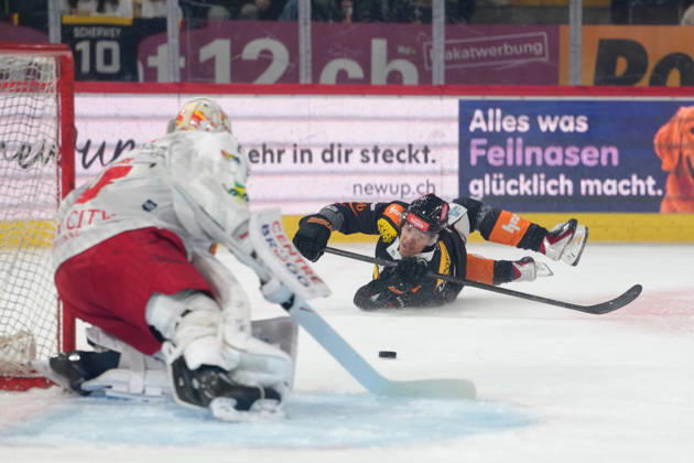 3014 Bern BE, Switzerland - October 09: Rodwin Dionicio (4 SCB) with a shoot while he falls on the ice during the National League match between SC Bern and EHC Biel-Bienne at PostFinance Arena on October 09, 2026 in 3014 Bern BE, Switzerland. Copyright: xKjetilxWaberx xSPPx Sportspressphoto_SPR249604