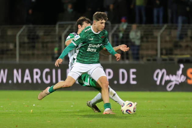 October 9, 2026, Soccer, Men s, Bavarian Regional League, 2026–2027 Season, Matchday 13: FC Schweinfurt 05 vs. SC Eltersdorf. From left: Patrick Ort (SC Eltersdorf), 14, against Lauris Bausenwein (FC Schweinfurt 05), 21. Schweinfurt, Riedel Bau Arena at Sachs Stadio, Bavaria, Lower Franconia, Germany