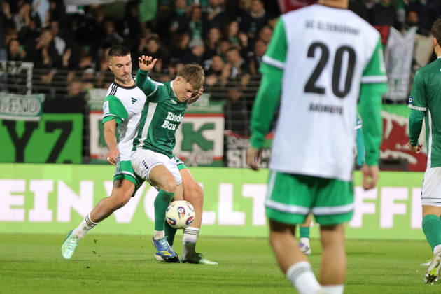 October 9, 2026, Soccer, Men s, Bavarian Regional League, 2026–2027 Season, Matchday 13: FC Schweinfurt 05 vs. SC Eltersdorf. From left: Yannik Jassmann (SC Eltersdorf, No. 09) and Gil Ebner (FC Schweinfurt 05, No. 08). Schweinfurt, Riedel Bau Arena at Sachs Stadio, Bavaria, Lower Franconia, Germany