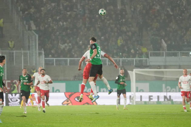 Germany 3rd Division 2026–2027, Matchday 8: SC Preußen Münster vs. Rot-Weiß Essen, Friday, October 9, 2026, LVM Preußenstadion, Münster, North Rhine-Westphalia, Germany; Heading duel: Lucas Zeller (SC Preußen Münster), 5; Marek Janssen (RW Essen), 20 Copyright: xMerlexKölkingx