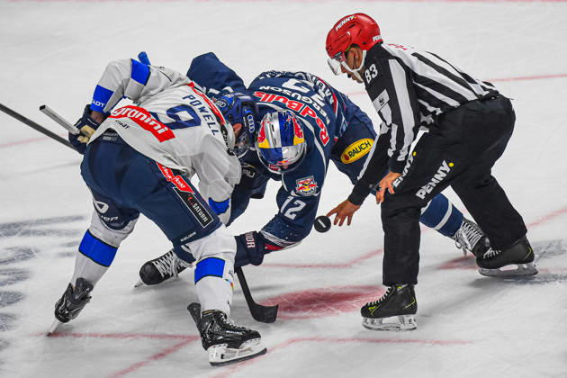 October 9, 2026, Munich, Germany PENNY DEL, German Ice Hockey League, 2026–27 season, Matchday 7: EHC Red Bull Munich vs. ERC Ingolstadt at SAP Garden in Munich; Brady Ferguson of EHC Red Bull Munich and Myles Powell of ERC Ingolstadt at the faceoff