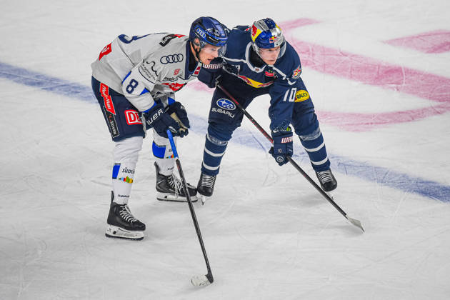 October 9, 2026, Munich, Germany PENNY DEL, German Ice Hockey League, 2026–27 season, Matchday 7: EHC Red Bull Munich vs. ERC Ingolstadt at SAP Garden in Munich; Elias Pul of ERC Ingolstadt and Elis Hede of EHC Red Bull Munich look pensive, serious, and focused