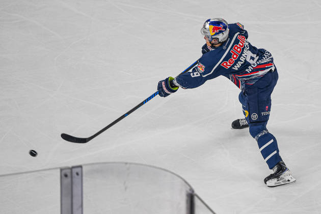 October 9, 2026, Munich, Germany PENNY DEL, German Ice Hockey League, 2026–27 season, Matchday 7: EHC Red Bull Munich vs. ERC Ingolstadt at SAP Garden in Munich; Moritz Warnecke of EHC Red Bull Munich taking a shot, aiming for the goal, and releasing the puck