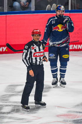 October 9, 2026, Munich, Germany; PENNY DEL, German Ice Hockey League, 2026–27 season, Matchday 7: EHC Red Bull Munich vs. ERC Ingolstadt at SAP Garden in Munich; Referee looking pensive, serious, and focused