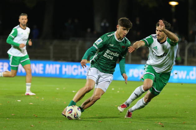 October 9, 2026, Soccer, Men s, Bavarian Regional League, 2026–2027 Season, Matchday 13: FC Schweinfurt 05 vs. SC Eltersdorf. From left: Lauris Bausenwein (FC Schweinfurt 05, No. 21) and Patrick Ort (SC Eltersdorf, No. 14). Schweinfurt, Riedel Bau Arena at Sachs Stadio, Bavaria, Lower Franconia, Germany