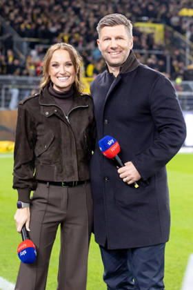 Dortmund, Germany, October 9, 2026, Bundesliga 2026–2027, Matchday 5: Borussia Dortmund vs. SV Werder Bremen. Pictured: Nele Ocik, SKY host, Thomas Hitzelsperger, SKY expert. DFL and DFB regulations prohibit any use of photographs as image sequences and or quasi-video. Signal Iduna Park, North Rhine-Westphalia Copyright: xFotostandx xZeisingx