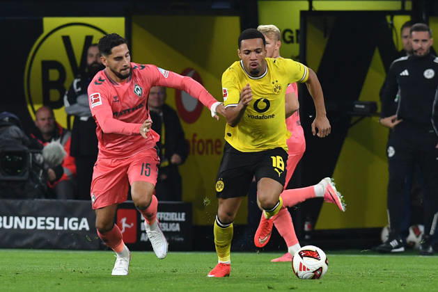 Ludovic Reis of Werder Bremen and Ethan Nwaneri of Borussia Dortmund battle for the ball during the Bundesliga match between Borussia Dortmund and SV Werder Bremen at Signal Iduna Park on October 9, 2026, in Dortmund, Germany Photo by Ralf Treese, DeFodi Images Ludovic Reis of Werder Bremen and Ethan Nwaneri of Borussia Dortmund battle for the ball during the Bundesliga match between Borussia Dortmund and SV Werder Bremen at Signal Iduna Park on October 9, 2026 in Dortmund, Germany. Photo by Ralf Treese, DeFodi Images. DFB and DFL regulations prohibit any use of photographs as image sequences and or quasi-video. Photo by Ralf Treese, DeFodi Images.