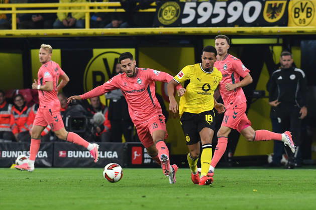 Ludovic Reis of Werder Bremen and Ethan Nwaneri of Borussia Dortmund battle for the ball during the Bundesliga match between Borussia Dortmund and SV Werder Bremen at Signal Iduna Park on October 9, 2026, in Dortmund, Germany Photo by Ralf Treese, DeFodi Images Ludovic Reis of Werder Bremen and Ethan Nwaneri of Borussia Dortmund battle for the ball during the Bundesliga match between Borussia Dortmund and SV Werder Bremen at Signal Iduna Park on October 9, 2026 in Dortmund, Germany. Photo by Ralf Treese, DeFodi Images. DFB and DFL regulations prohibit any use of photographs as image sequences and or quasi-video. Photo by Ralf Treese, DeFodi Images.