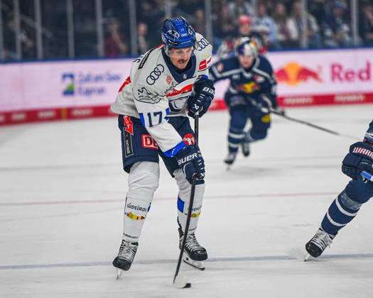 October 9, 2026, Munich, Germany PENNY DEL, German Ice Hockey League, 2026–27 season, Matchday 7: EHC Red Bull Munich vs. ERC Ingolstadt at SAP Garden in Munich. Taro Hirose of EHC Red Bull Munich passing, making a pass, and handing off the puck