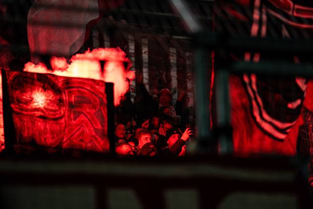 October 9, 2026, 3rd Division, Matchday 8, SC Preußen Münster vs. Rot Weiss Essen at the LVM Preußenstadion. Rot Weiss Essen fans cheer on their team with pyrotechnics. IMPORTANT NOTICE: In accordance with DFB and DFL regulations, it is prohibited to to use or allow the use of photographs taken in the stadium and or during the game in the form of sequential images and or video-like photo sequences Copyright: xJordyxFourgonx