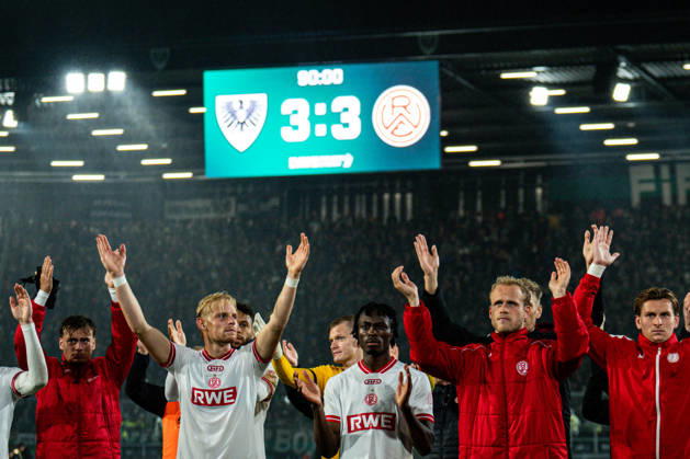October 9, 2026, 3rd Division, Matchday 8, SC Preußen Münster vs. Rot Weiss Essen at the LVM Preußenstadion, Rot Weiss Essen in front of the stands IMPORTANT NOTICE: In accordance with DFB and DFL regulations, it is prohibited to use or allow the use of photographs taken in the stadium and or during the game in the form of sequential images and or video-like photo series. Copyright: xJordyxFourgonx