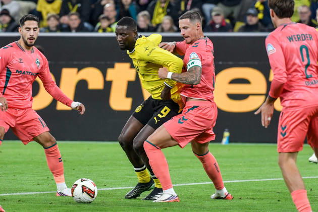 From left: Serhou Guirassy (Dortmund 9) and Marco Friedl (Bremen 32) in a one-on-one battle, September 10, 2026 ¢ Soccer ¢ Borussia Dortmund vs. SV Werder Bremen, Signal Iduna Park, Dortmund, DFB DFL regulations prohibit any use of photographs as image sequences and or quasi-video NRW Germany Copyright: xpepphotox xSaschaxWeizx pep00321, pep_20261009_sw