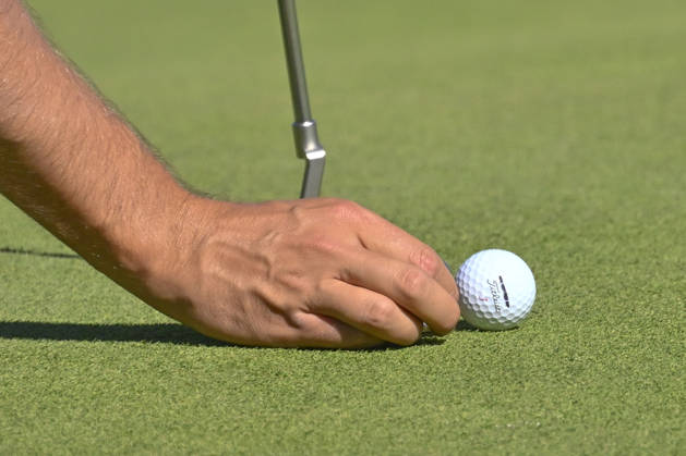 October 9, 2026, Madrid, Madrid, Spain: Close-up of a playerÃ¢â‚¬â ¢s hand placing the ball on the mark during the Open de EspaoÂ±a presented by Madrid at Club de Campo Villa de Madrid on October 09, 2026 in Madrid, Spain. Madrid Spain - ZUMAc312 20261009_zsp_c312_428 Copyright: xOscarxManuelxSanchezx