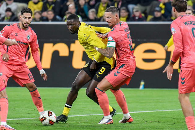 From left: Serhou Guirassy (Dortmund 9) and Marco Friedl (Bremen 32) in a one-on-one battle, September 10, 2026 ¢ Soccer ¢ Borussia Dortmund vs. SV Werder Bremen, Signal Iduna Park, Dortmund, DFB DFL regulations prohibit any use of photographs as image sequences and or quasi-video NRW Germany Copyright: xpepphotox xSaschaxWeizx pep00321, pep_20261009_sw
