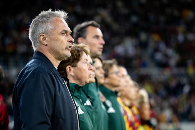 October 9, 2026, GER, Soccer, Women s, International Match, Karlsruhe, Germany vs. Australia; Christian Wück, Germany s national team coach, during the national anthem; Karlsruhe BBBank Wildpark, Baden-Württemberg, Germany Copyright: xNordphoto Memmlerx