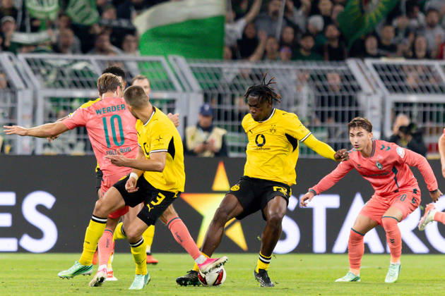 Dortmund, Germany, October 9, 2026, Bundesliga 1, 2026–2027, Matchday 5: Borussia Dortmund vs. SV Werder Bremen. Pictured, from left, in a tackle: Niclas Füllkrug (SVW), Waldemar Anton (BVB), Joane Gadou (BVB), and Chuki (SVW). DFL and DFB regulations prohibit any use of photographs as image sequences and or quasi-video. Signal Iduna Park, North Rhine-Westphalia Copyright: xFotostandx xZeisingx