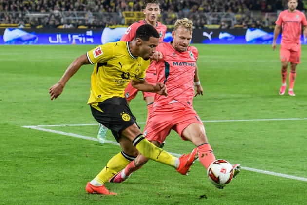 From left: Ethan Nwaneri (Dortmund, 18) and Marco Grüll (Bremen, 17) in a one-on-one battle, September 9, 2026 ¢ Soccer ¢ Borussia Dortmund vs. SV Werder Bremen, Signal Iduna Park, Dortmund, DFB DFL regulations prohibit any use of photographs as image sequences and or quasi-video NRW Germany Copyright: xpepphotox xSaschaxWeizx pep00321, pep_20261009_sw