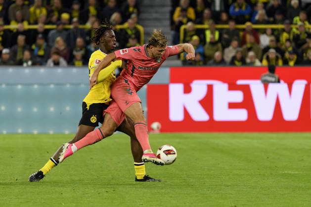 Joane Gadou of Borussia Dortmund and Niclas Fuellkrug of SV Werder Bremen battle for the ball during the Bundesliga match between Borussia Dortmund and SV Werder Bremen at Signal Iduna Park on October 9, 2026, in Dortmund, Germany Photo by Max Maiwald DeFodi Images Joane Gadou of Borussia Dortmund and Niclas Füllkrug of SV Werder Bremen battle for the ball during the Bundesliga match between Borussia Dortmund and SV Werder Bremen at Signal Iduna Park on October 9, 2026 in Dortmund, Germany. Photo by Max Maiwald, DeFodi Images. DFB and DFL regulations prohibit any use of photographs as image sequences and or quasi-video. Photo by Max Maiwald, DeFodi Images.