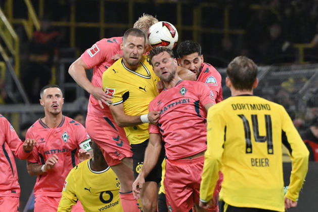 Heading duel: Marco Grüll (Werder Bremen), Waldemar Anton (Borussia Dortmund), Niclas Füllkrug (Werder Bremen), from left, September 10, 2026, Soccer, Bundesliga, 2026–2027 season, Matchday 5, Borussia Dortmund vs. SV Werder Bremen. DFL regulations prohibit any use of photographs as image sequences and or quasi-video. Dortmund, Signal Iduna Park, North Rhine-Westphalia, Germany Team2