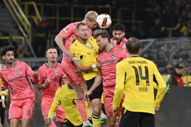 Heading duel: Marco Grüll (Werder Bremen), Waldemar Anton (Borussia Dortmund), Niclas Füllkrug (Werder Bremen), from left, September 10, 2026, Soccer, Bundesliga, 2026–2027 season, Matchday 5, Borussia Dortmund vs. SV Werder Bremen. DFL regulations prohibit any use of photographs as image sequences and or quasi-video. Dortmund, Signal Iduna Park, North Rhine-Westphalia, Germany Team2