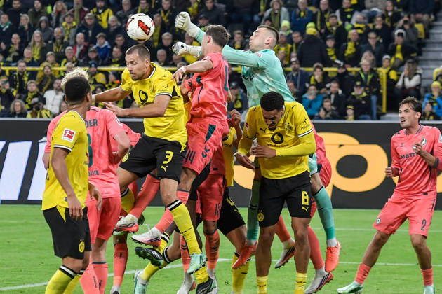 Karl Hein (Bremen 1) thwarts a scoring chance by Waldemar Anton (Dortmund 3) September 10, 2026 ¢ Soccer ¢ Borussia Dortmund vs. SV Werder Bremen, Signal Iduna Park, Dortmund, DFB and DFL regulations prohibit any use of photographs as image sequences and or quasi-video. NRW, Germany Copyright: xpepphotox xSaschaxWeizx pep00321, pep_20261009_sw