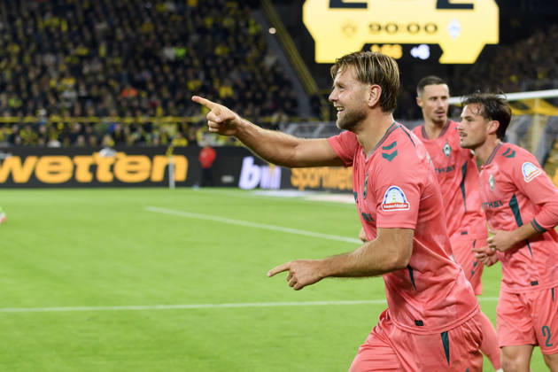 Niclas Fuellkrug of SV Werder Bremen celebrates his goal, which tied the score at 2–2, during the Bundesliga match between Borussia Dortmund and SV Werder Bremen at Signal Iduna Park on October 9, 2026, in Dortmund, Germany. Photo by Max Maiwald, DeFodi Images. Niclas Fuellkrug of SV Werder Bremen celebrates after scoring his team’s second goal during the Bundesliga match between Borussia Dortmund and SV Werder Bremen at Signal Iduna Park on October 9, 2026 in Dortmund, Germany. Photo by Max Maiwald, DeFodi Images. DFB and DFL regulations prohibit any use of photographs as image sequences and or quasi-video. Photo by Max Maiwald, DeFodi Images.