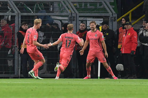 Niclas Fuellkrug of Werder Bremen celebrates a goal with his teammates after scoring the 2-2 equalizer during the Bundesliga match between Borussia Dortmund and SV Werder Bremen at Signal Iduna Park on October 9, 2026, in Dortmund, Germany. Photo by Ralf Treese, DeFodi Images. Niclas Fuellkrug of Werder Bremen celebrates after scoring his team’s second goal with teammates during the Bundesliga match between Borussia Dortmund and SV Werder Bremen at Signal Iduna Park on October 9, 2026 in Dortmund, Germany. Photo by Ralf Treese, DeFodi Images. DFB and DFL regulations prohibit any use of photographs as image sequences and or quasi-video. Photo by Ralf Treese, DeFodi Images.