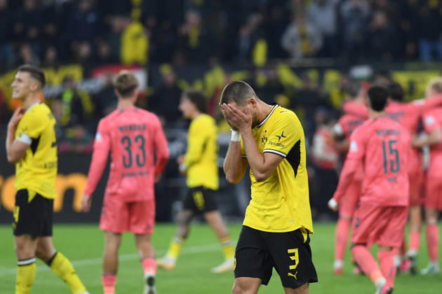 Nico Schlotterbeck of Borussia Dortmund and Waldemar Anton of Borussia Dortmund look dejected after the game during the Bundesliga match between Borussia Dortmund and SV Werder Bremen at Signal Iduna Park on October 9, 2026, in Dortmund, Germany. Photo by Ralf Treese, DeFodi Images. Nico Schlotterbeck of Borussia Dortmund and Waldemar Anton of Borussia Dortmund look dejected after the game during the Bundesliga match between Borussia Dortmund and SV Werder Bremen at Signal Iduna Park on October 9, 2026 in Dortmund, Germany Photo by Ralf Treese DeFodi Images DFB and DFL regulations prohibit any use of photographs as image sequences and or quasi-video Photo by Ralf Treese DeFodi Images