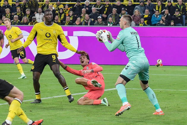 Karl Hein (Bremen 1) thwarts a scoring chance by Dortmund October 9, 2026 ¢ Soccer ¢ Borussia Dortmund vs. SV Werder Bremen, Signal Iduna Park, Dortmund, DFB and DFL regulations prohibit any use of photographs as image sequences and or quasi-video. NRW, Germany Copyright: xpepphotox xSaschaxWeizx pep00321, pep_20261009_sw