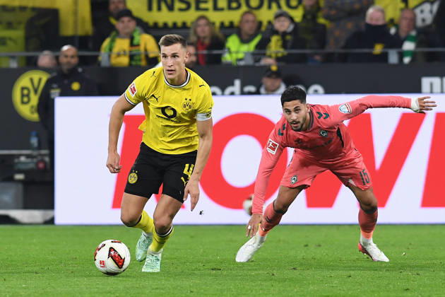 Nico Schlotterbeck of Borussia Dortmund and Ludovic Reis of Werder Bremen battle for the ball during the Bundesliga match between Borussia Dortmund and SV Werder Bremen at Signal Iduna Park on October 9, 2026, in Dortmund, Germany Photo by Ralf Treese, DeFodi Images Nico Schlotterbeck of Borussia Dortmund and Ludovic Reis of Werder Bremen battle for the ball during the Bundesliga match between Borussia Dortmund and SV Werder Bremen at Signal Iduna Park on October 9, 2026 in Dortmund, Germany Photo by Ralf Treese DeFodi Images DFB and DFL regulations prohibit any use of photographs as image sequences and or quasi-video Photo by Ralf Treese DeFodi Images