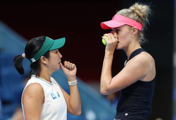 (261010) -- BEIJING, Oct. 10, 2026 -- Erin Routliffe Aldila Sutjiadi (L) discuss during the women s doubles semifinal match between Katerina Siniakova (the Czech Republic) Zhang Shuai (China) and Erin Routliffe (New Zealand) Aldila Sutjiadi (Indonesia) at 2026 China Open tennis tournament in Beijing, China, Oct. 10, 2026. ) (SP)CHINA-BEIJING-TENNIS-CHINA OPEN-WOMEN S DOUBLES (CN) ZhangxChenlin