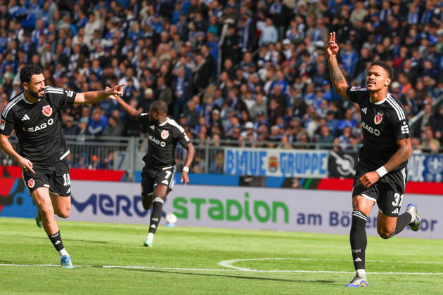 October 10, 2026, Soccer, 2. Bundesliga, SV Darmstadt 98 vs. Energie Cottbus, from left: Tolcay Cigereci (Energie Cottbus) and Justin Butler (Energie Cottbus) are seen celebrating after scoring a goal to make the score 0–1 Copyright: HMBxMedia JoaquimxFerreira