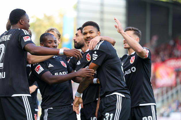 October 10, 2026 Soccer 2. Bundesliga SV Darmstadt 98 vs. Energie Cottbus, Justin Butler of Energie Cottbus and his teammates are seen celebrating after scoring a goal to make the score 0–1 Copyright: HMBxMedia JoaquimxFerreira