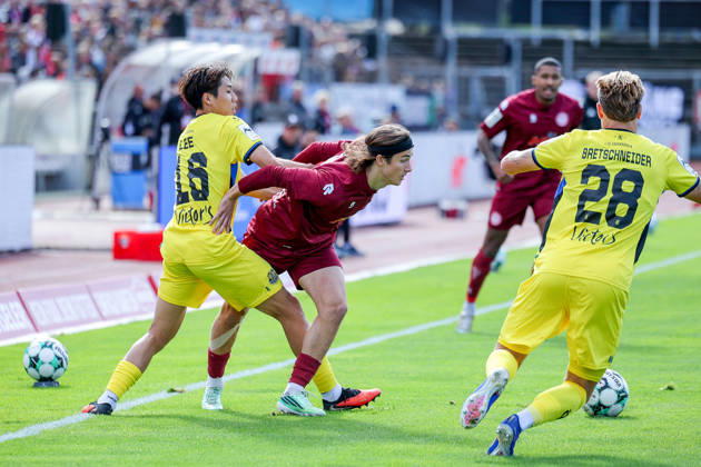 October 10, 2026, xsefx, Soccer, SC Fortuna Köln vs. 1 FC Saarbrücken, 3. Liga, Südstation, Matchday 8, 2026–2027 Season Seung Joon Lee of 1. FC Saarbrücken (16) in a tackle against Bennit Bröger of Fortuna Cologne (38). DFB regulations prohibit any use of photographs as image sequences and or quasi-video. North Rhine-Westphalia, Germany