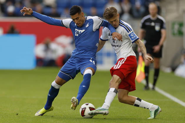 From left to right: Adam Daghim of TSG Hoffenheim and David Moller Wolfe of HSV, in the Bundesliga match between TSG 1899 Hoffenheim and Hamburger SV at the PreZero Arena, Sinsheim, Germany, on October 10, 2026, in action during the Bundesliga match between TSG 1899 Hoffenheim and Hamburger SV at the PreZero Arena, Sinsheim, Germany, on October 10, 2026. DFB and DFL regulations prohibit any use of photographs as image sequences and or quasi-video, Copyright: HMBxMedia xHeikoxBecker