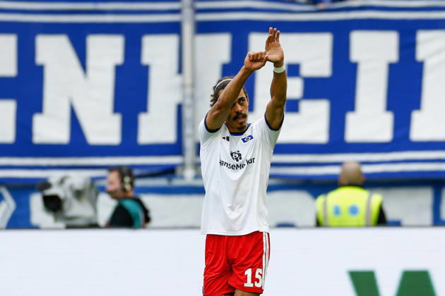 Goal scorer Yussuf Poulsen of HSV celebrates after scoring the 0-1 goal; celebrating, being celebrated, cheers, cheering, Cheers after the goal, cheering, celebrated, cheers, cheering, emotions during the Bundesliga match between TSG 1899 Hoffenheim and Hamburger SV at the PreZero Arena, Sinsheim, Germany, on October 10, 2026, in action during the Bundesliga match between TSG 1899 Hoffenheim and Hamburger SV at the PreZero Arena, Sinsheim, Germany, on October 10, 2026. DFB and DFL regulations prohibit any use of photographs as image sequences and or quasi-video, Copyright: HMBxMedia xHeikoxBecker