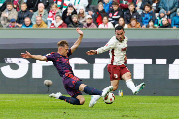 Arijon Ibrahimovic 21, FC Augsburg, and Joshua Kimmich 6, FC Bayern Munich, during the match between FC Augsburg and FC Bayern Munich, soccer, men s, Bundesliga, 2026–2027, Matchday 5 on October 10, 2026, in Augsburg, WWK ARENA. DFL and DFB regulations prohibit any use of photographs as image sequences and or quasi-video. Bayern, Germany