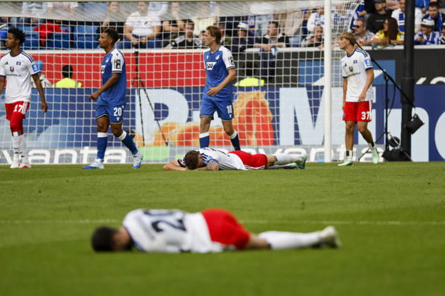 Fabio Vieira (Hamburger SV), 20, and Nicolai Remberg (Hamburger SV), 21, injured on the field, Germany, soccer, Bundesliga 1, Matchday 5, 2026–2027, TSG Hoffenheim vs. Hamburger SV, October 10, 2026, Sinsheim SNP Arena, Germany Copyright: xGrantxHubbsx