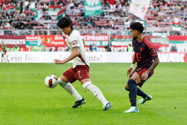 Young Woo Seol 7, FC Augsburg, and Luis Diaz 14, FC Bayern Munich, during the match between FC Augsburg and FC Bayern Munich, soccer, men s, Bundesliga, 2026–2027, Matchday 5 on October 10, 2026, in Augsburg, WWK ARENA. DFL and DFB regulations prohibit any use of photographs as image sequences and or quasi-video. Bayern, Germany