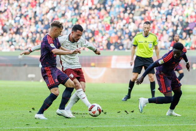Arijon Ibrahimovic 21, FC Augsburg, and Joshua Kimmich 6, FC Bayern Munich, during the match between FC Augsburg and FC Bayern Munich, soccer, men s, Bundesliga, 2026–2027, Matchday 5 on October 10, 2026, in Augsburg, WWK ARENA. DFL and DFB regulations prohibit any use of photographs as image sequences and or quasi-video. Bavaria, Germany