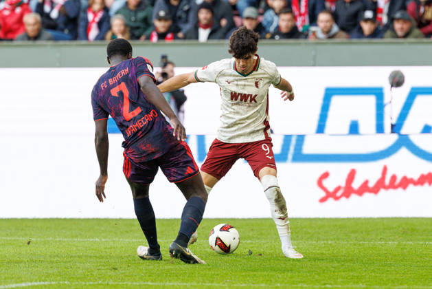 Rodrigo Ribeiro 9, FC Augsburg, and Dayot Upamecano 2, FC Bayern Munich, during the match between FC Augsburg and FC Bayern Munich, soccer, men s, Bundesliga, 2026–2027, Matchday 5 on October 10, 2026, in Augsburg, WWK ARENA. DFL and DFB regulations prohibit any use of photographs as image sequences and or quasi-video. Bayern, Germany