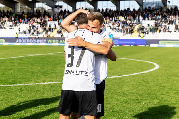 SSV Ulm 1846 Soccer vs. Eintracht Frankfurt II, Soccer, Regionalliga Southwest, Matchday 11, Donaustadion Ulm 10 10 26 Joy, celebration, and excitement at SSV Ulm 1846 Soccer after their first league win since April. From left: Moritz Heinrich, SSV Ulm 1846 Soccer, 37, Alexander Kopf, SSV Ulm 1846 Soccer, 20; SSV Ulm 1846 Soccer vs. Eintracht Frankfurt II, Soccer, Southwest Regional League, Matchday 11, Donaustadion, Ulm, October 26, Photo by Lucca Fundel, Ulm, Donaustadion, Baden-Württemberg, Germany