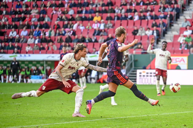 Calvin Brackelmann of FC Augsburg and Harry Kane of FC Bayern Munich battle for the ball during the Bundesliga match between FC Augsburg and FC Bayern Munich, at the WWK Arena on October 10, 2026, in Augsburg, Germany. Photo by Harry Langer, DeFodi Images. Calvin Brackelmann of FC Augsburg and Harry Kane of FC Bayern Munich battle for the ball during the Bundesliga match between FC Augsburg and FC Bayern Munich at the WWK Arena on October 10, 2026 in Augsburg, Germany. Photo by Harry Langer, DeFodi Images. DFB and DFL regulations prohibit any use of photographs as image sequences and or quasi-video. Photo by Harry Langer, DeFodi Images. DFB and DFL regulations prohibit any use of photographs as imSEQUENCES AND OR QUASI-VIDEO