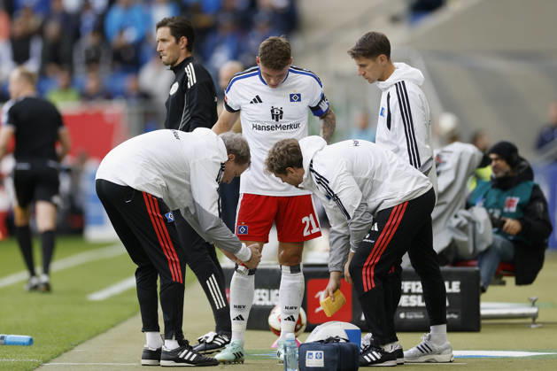 Nicolai Remberg (HSV), injured, injury, during the Bundesliga match between TSG 1899 Hoffenheim and Hamburger SV at the PreZero Arena, Sinsheim, Germany, on October 10, 2026, in action during the Bundesliga match between TSG 1899 Hoffenheim and Hamburger SV at the PreZero Arena, Sinsheim, Germany, on October 10, 2026. DFB and DFL regulations prohibit any use of photographs as image sequences and or quasi-video, Copyright: HMBxMedia xHeikoxBecker